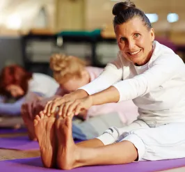 active older woman doing yoga