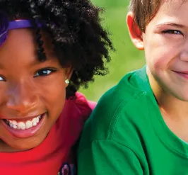 two kids smiling