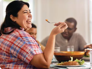 A family sitting down for a healthy meal
