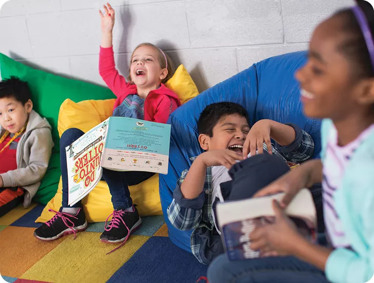 group of kids reading books