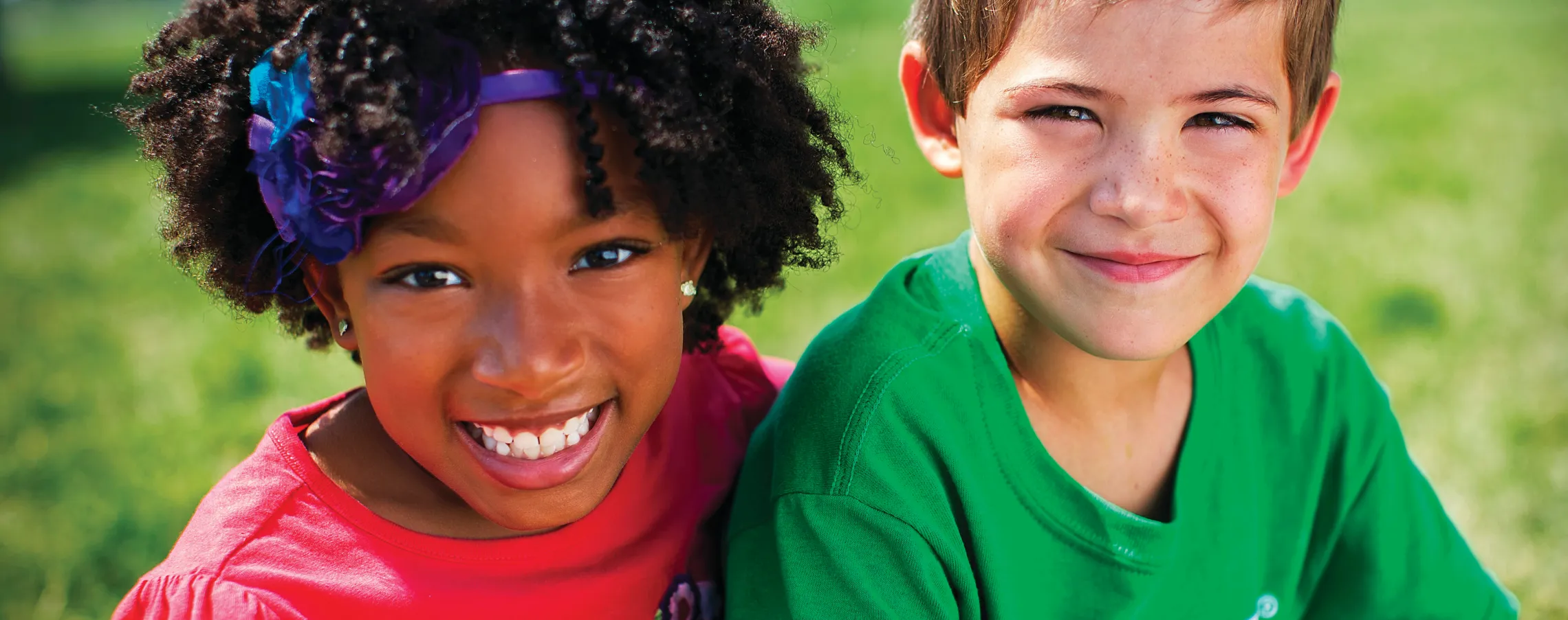 two kids smiling