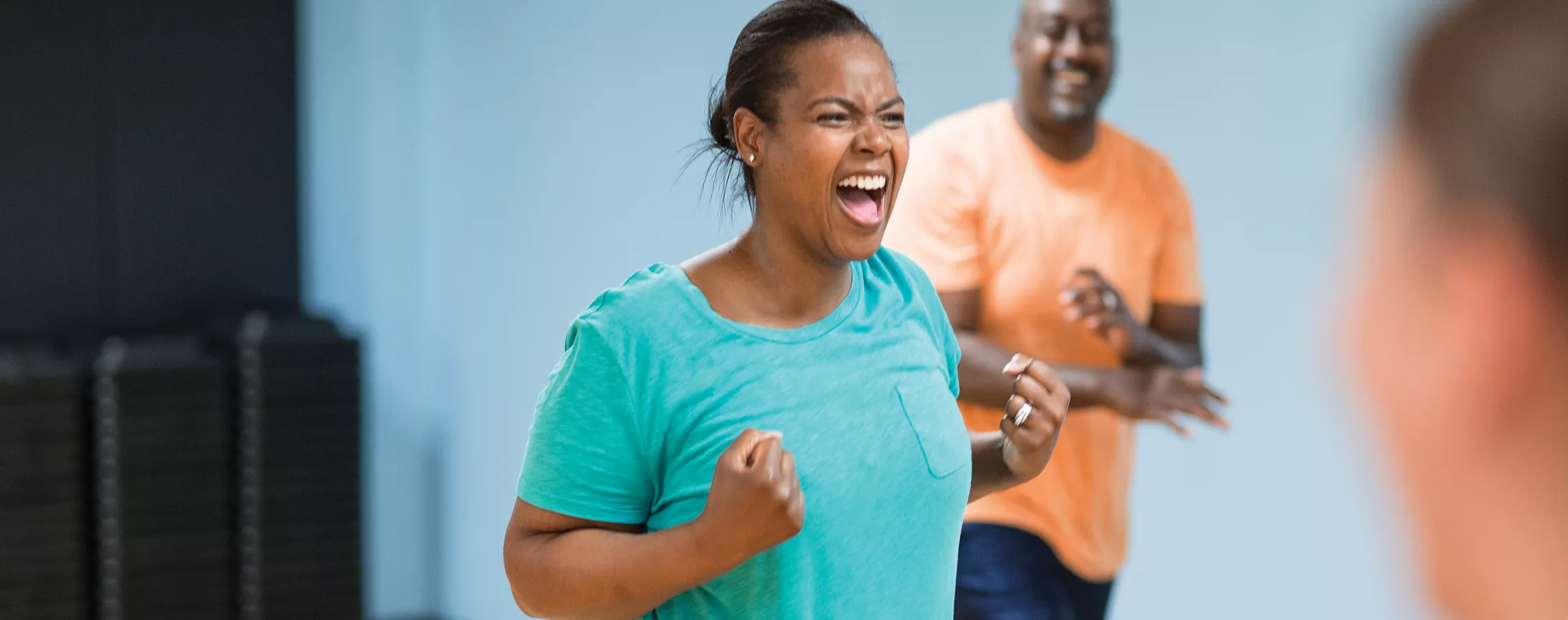woman participating in a group fitness class