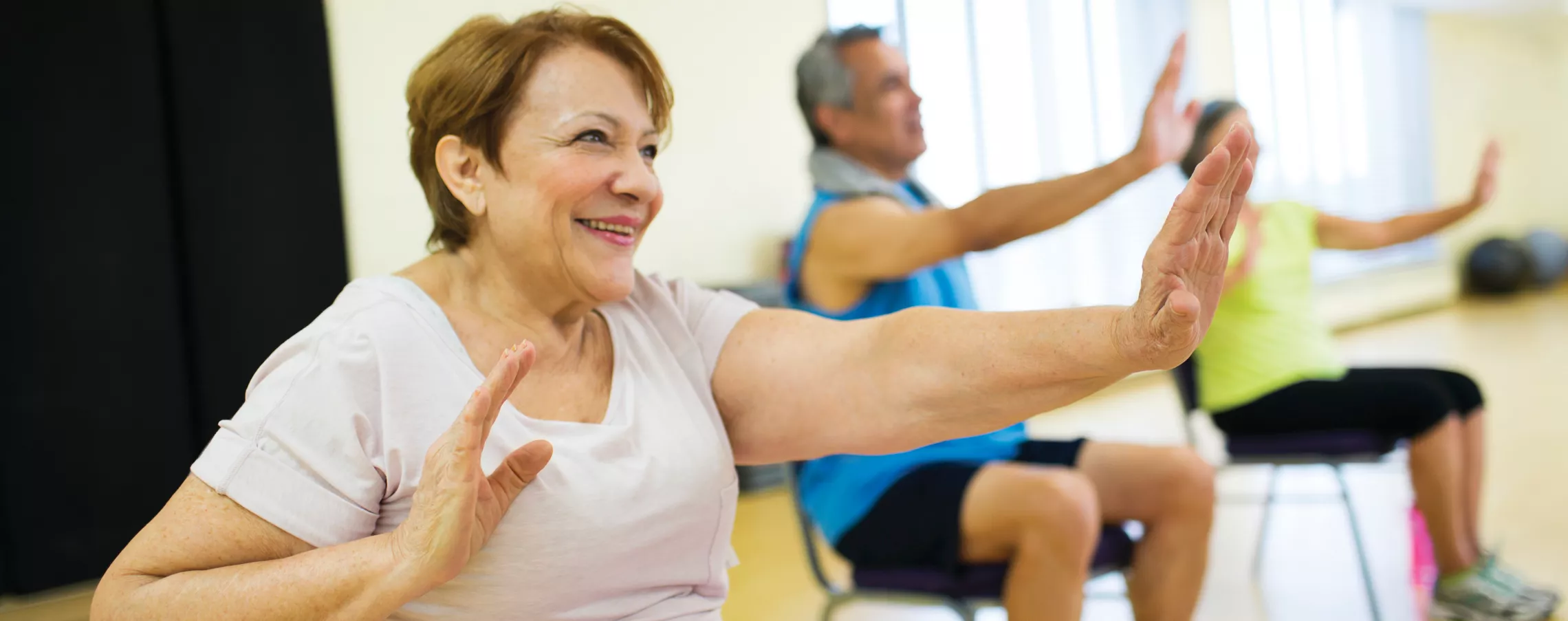 enhanced fitness group exercise class