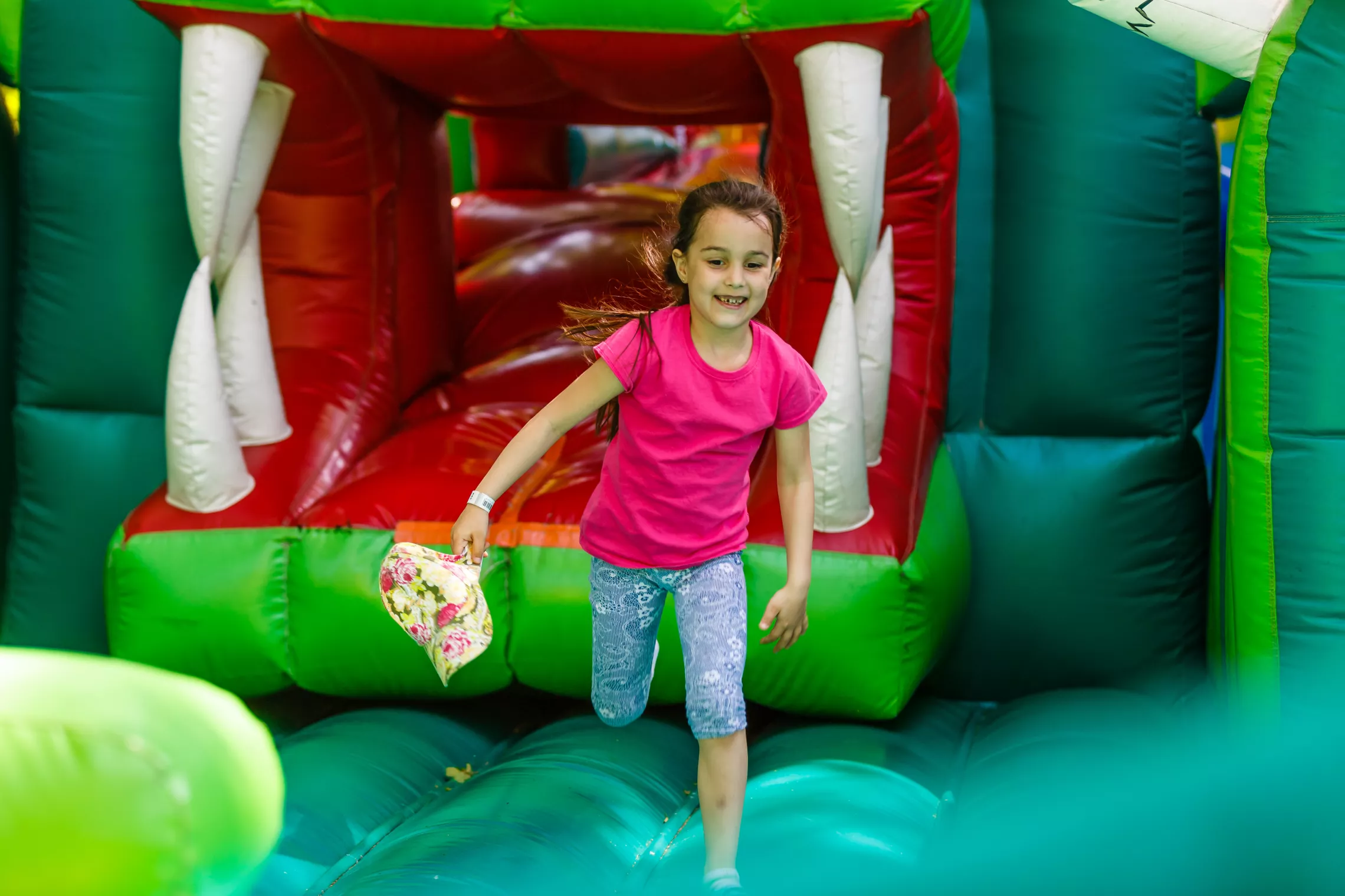 Girl playing in bounce house