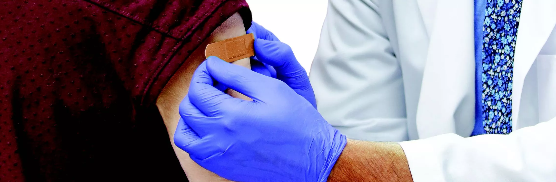 doctor providing flu shot