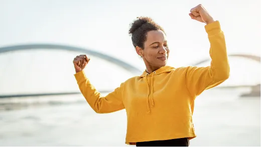 Woman flexing her muscles