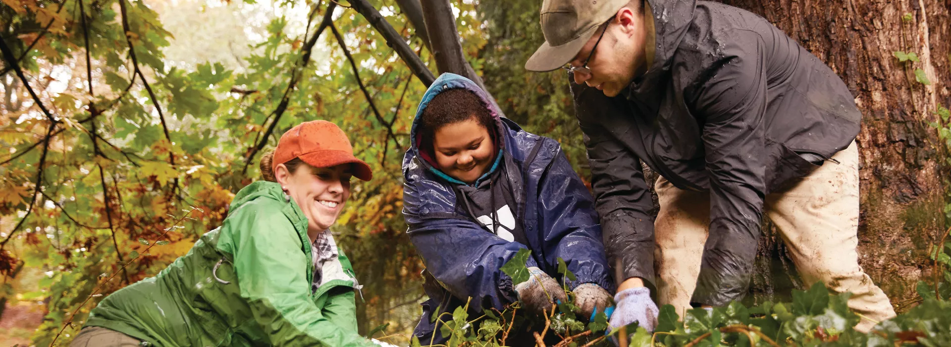 Three people volunteering