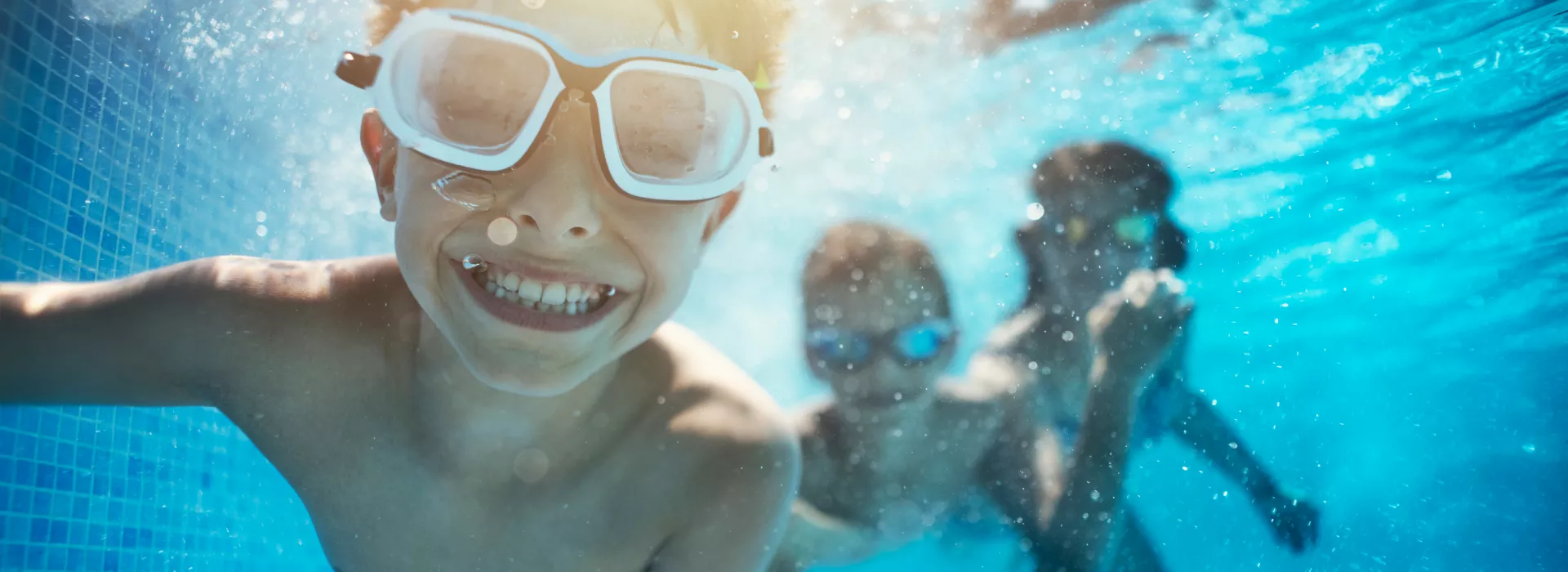 kids swimming underwater