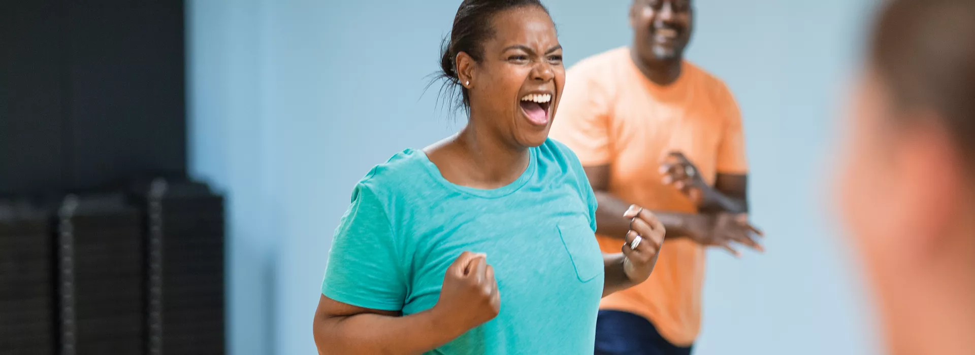 woman participating in a group fitness class