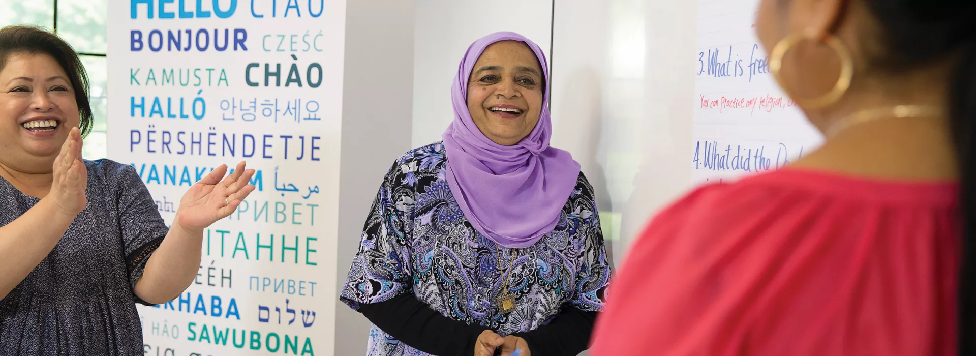 three women celebrating welcoming week